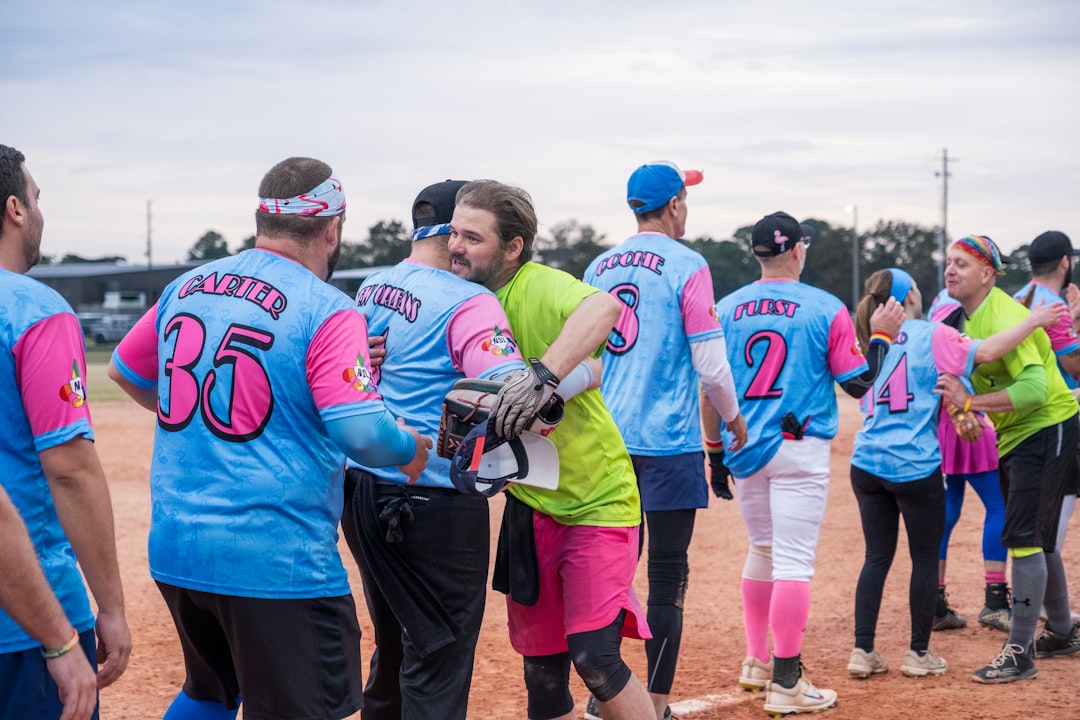 Custom softball jersey with player name and number in team colors