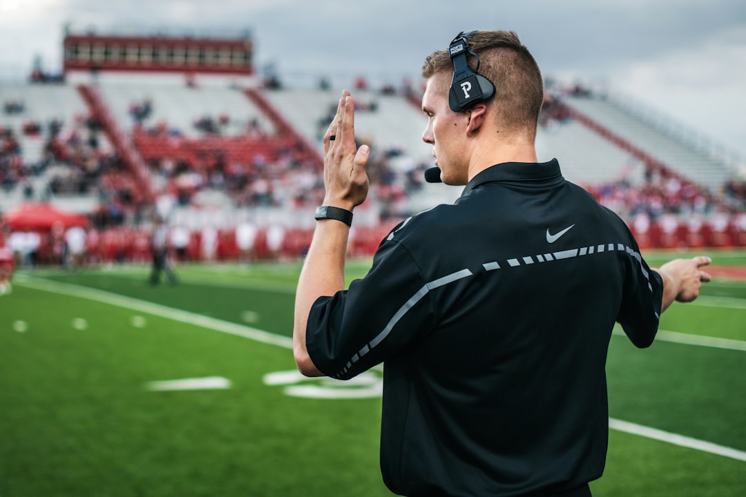 Which colleges produce the most FBS head coaches?